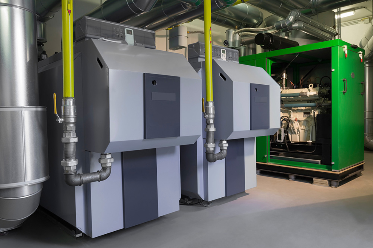 Blockheiz­kraftwerk bei Muster Elektro in Musterstadt